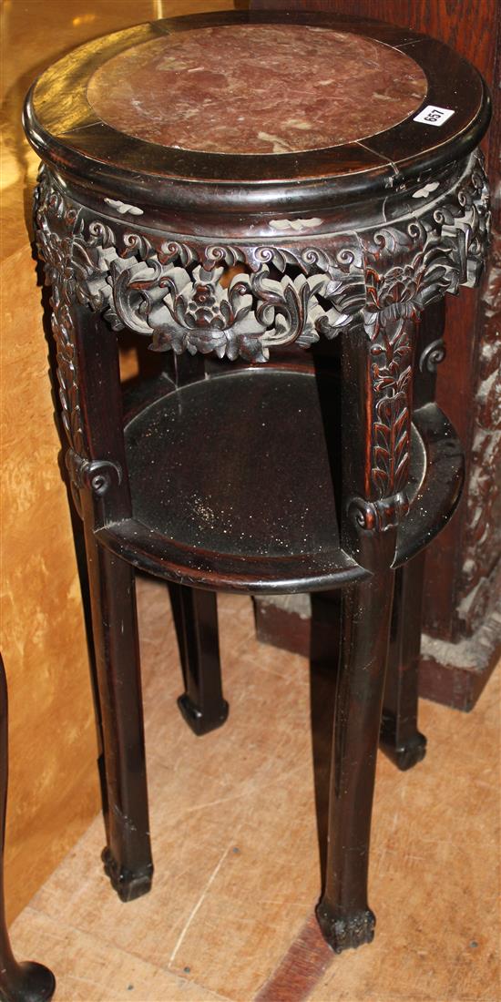 Late 19th century Chinese hardwood two tier circular table(-)